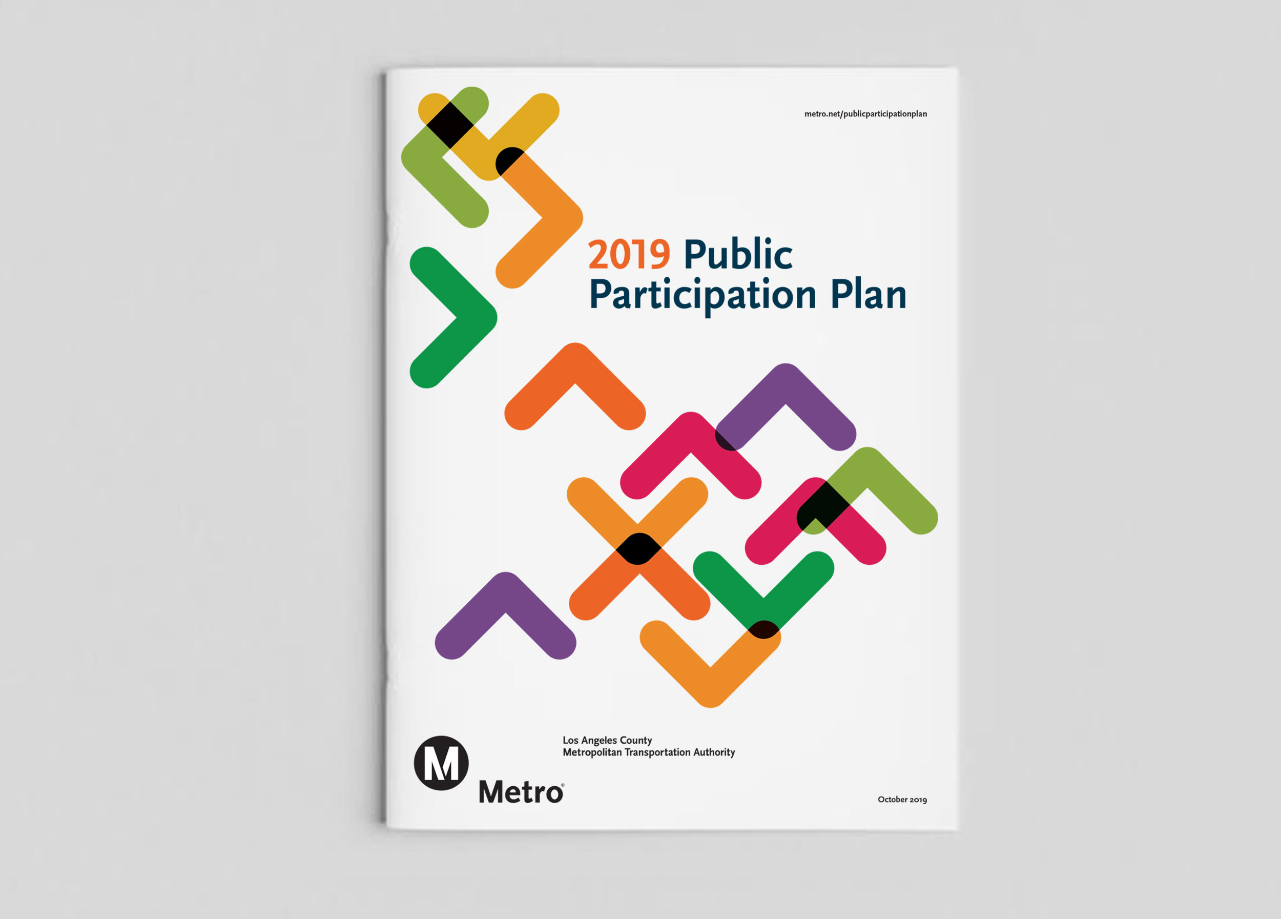 A copy of the Public Participation Plan book lying on a flat surface.